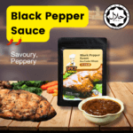 SpicyMama black pepper sauce displayed in a packet, emphasizing its deep color and bold flavor profile for culinary use.