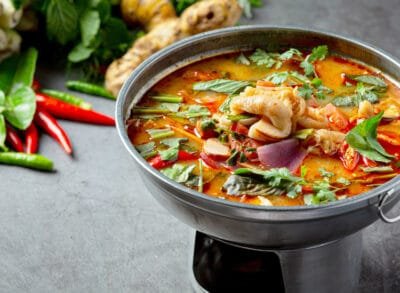 a bowl of soup with vegetables and meat from spicy mama