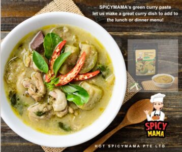 A bowl of green curry paste, featuring a bold green hue and a thick consistency, ideal for enhancing meals.