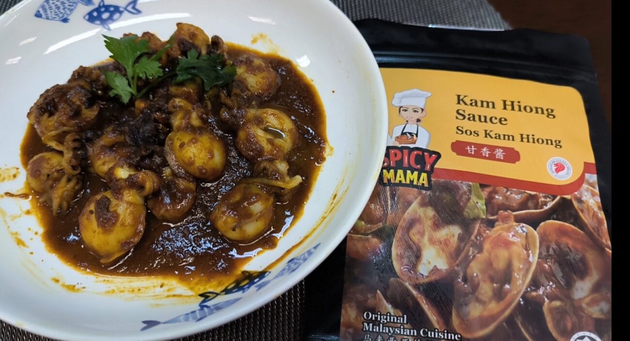 A close-up of Kim Khao Hiang sauce, part of a Kam Hiong cuttlefish dish made with SpicyMama paste, highlighting its rich flavor.