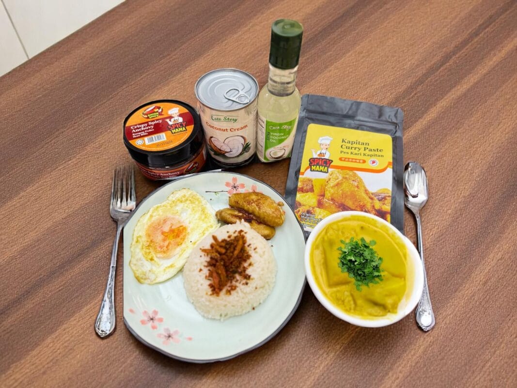 A dish with curry, eggs, rice, and soup, arranged neatly on a plate, highlighting a diverse meal.